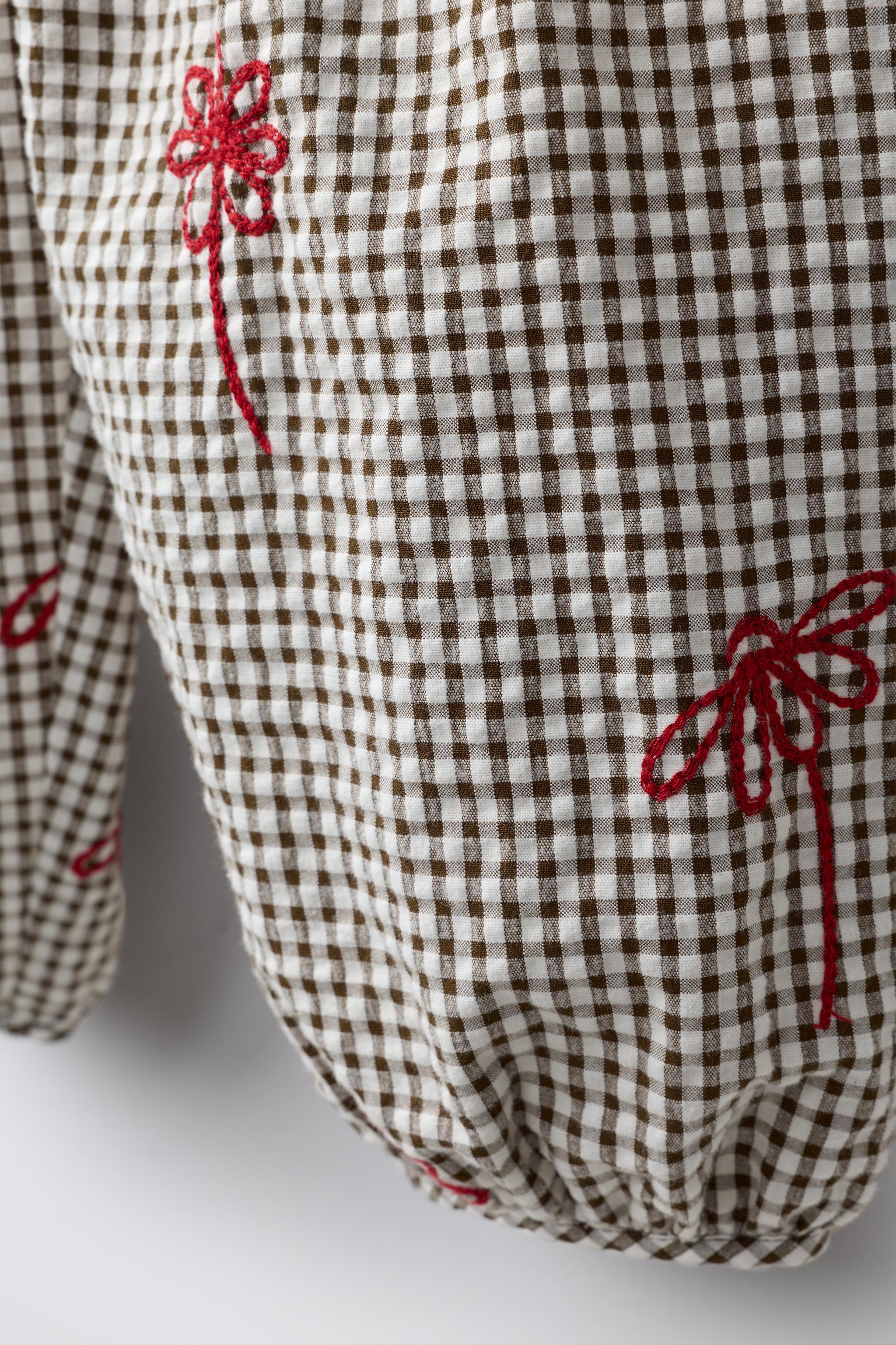 PANTALON SAROUEL À CARREAUX ET FLEURS BRODÉES